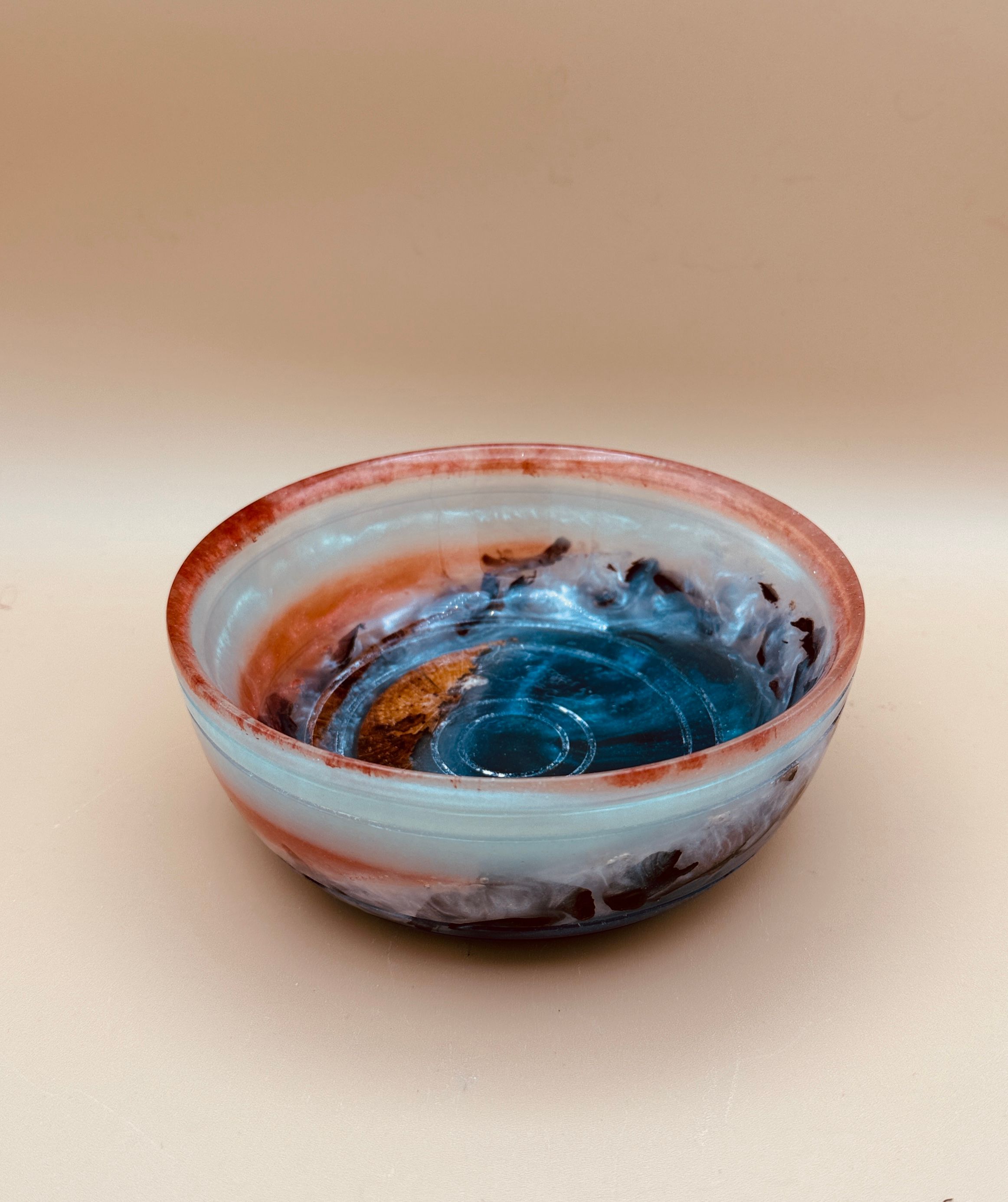 Fen Green and Rust Colored Resin Highlight this Wood Bowl